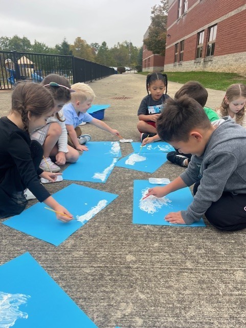"Cloud hunting and painting our sky treasures!