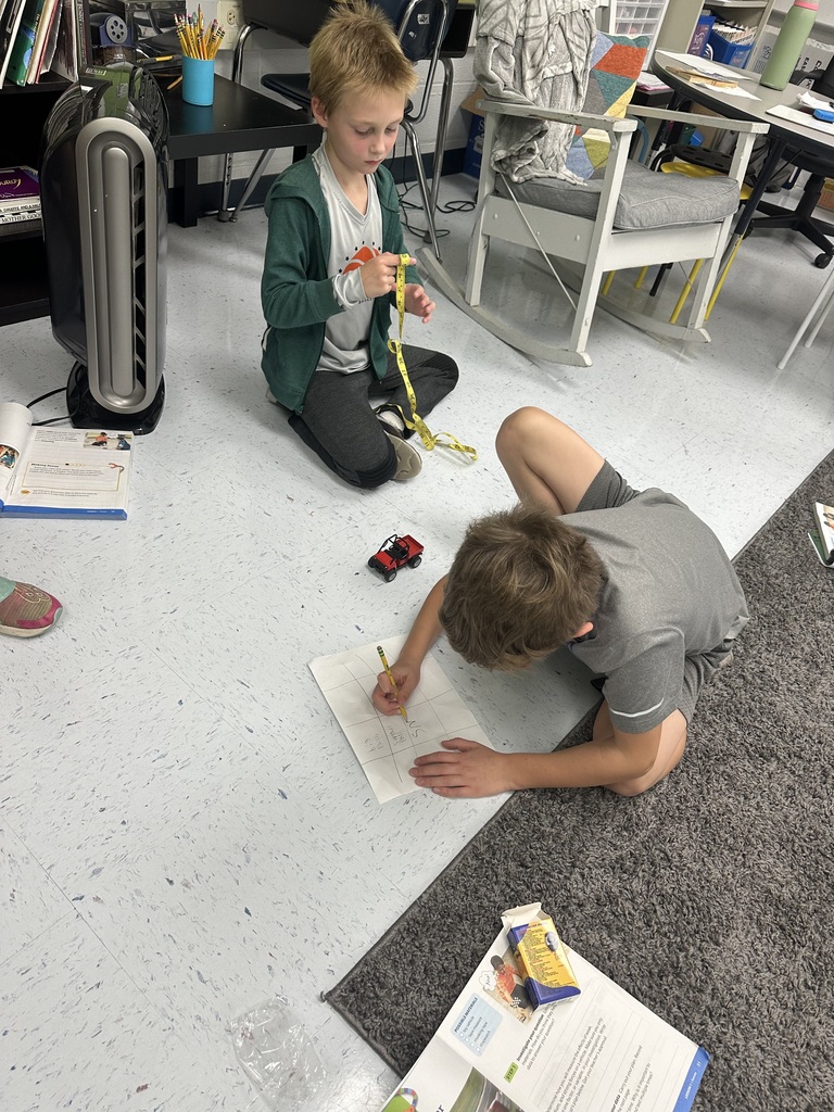 Mrs. Rogers’ 3rd grade class investigates the effects of force and motion through a hands-on experiment using a toy car, tape measure, masking tape, and stopwatch.