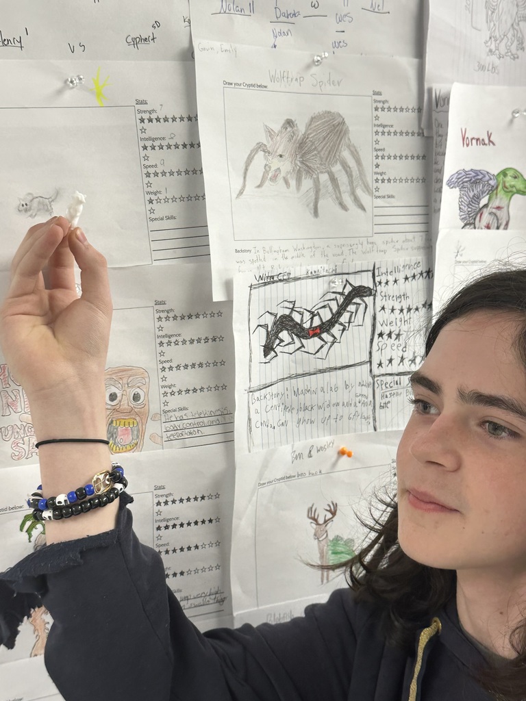 Student holding up a 3D printed object