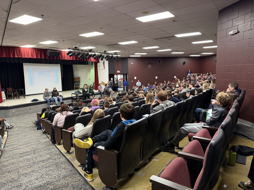 students in the auditorium listening to MTEC speaker
