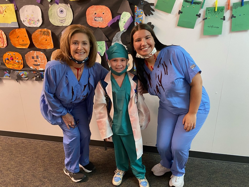 Our staff rocked the costumes and brought the Halloween fun to school today!