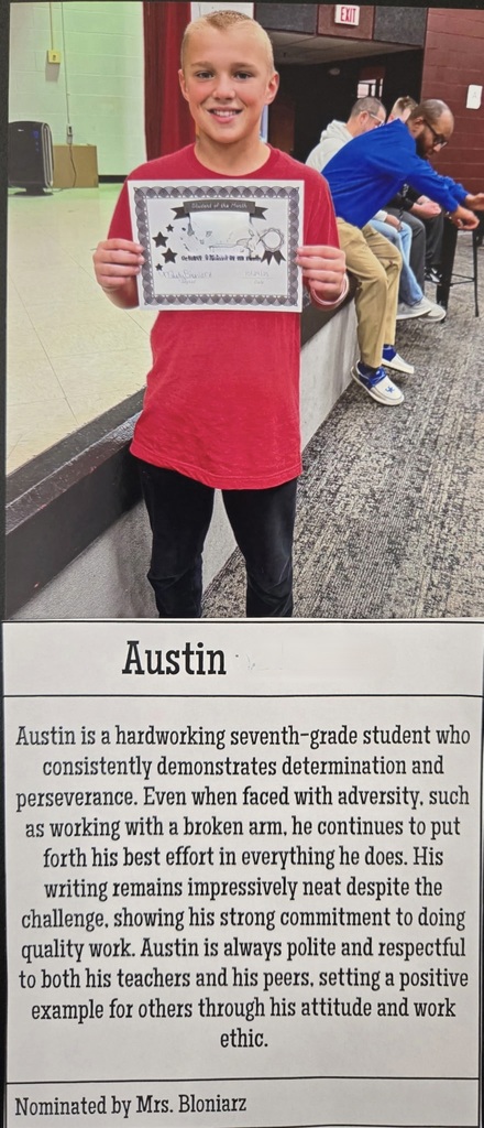 student holding a certificate
