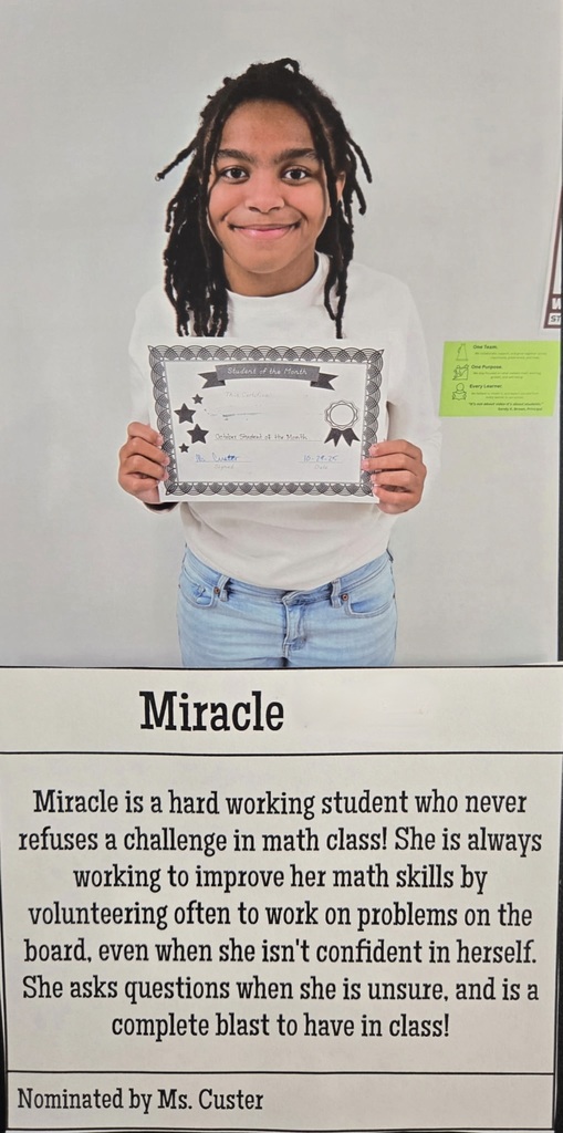 student holding a certificate