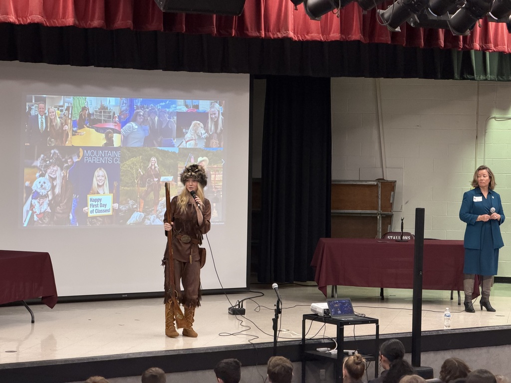 Mountaineer on stage with her mother