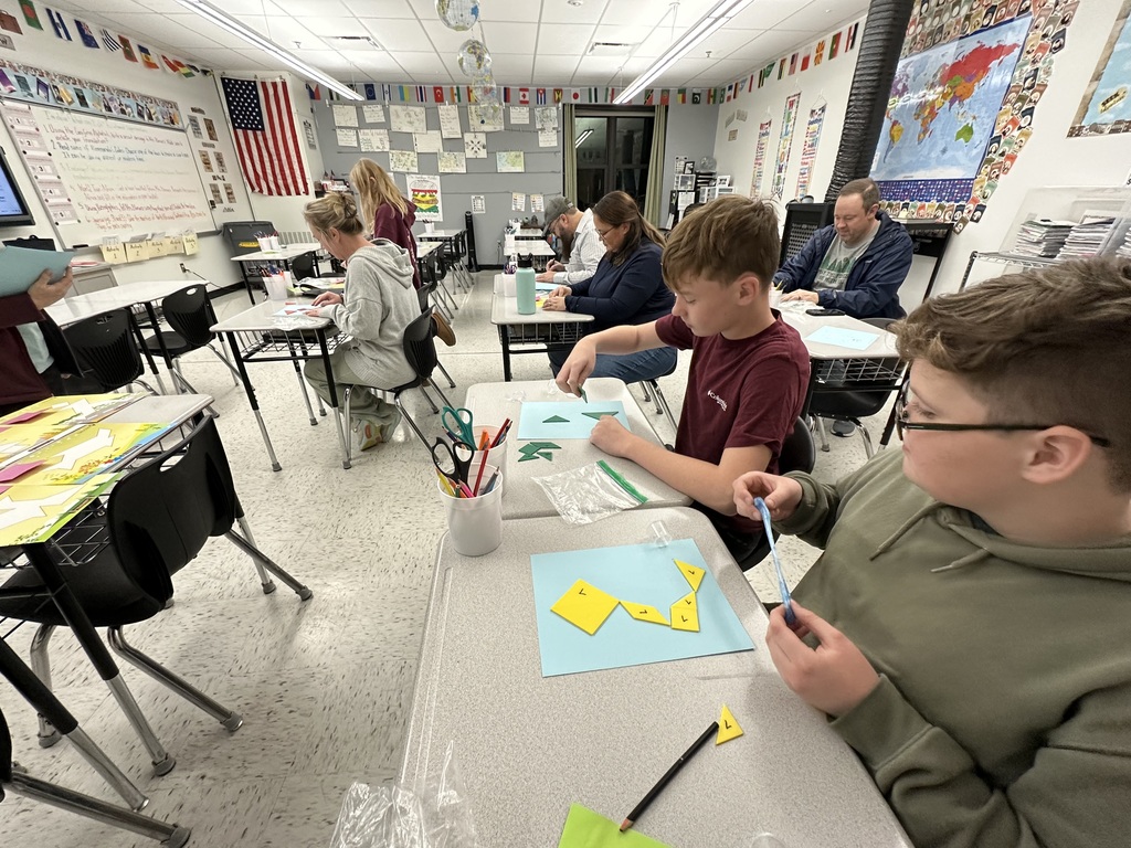 Students working with Tangrams
