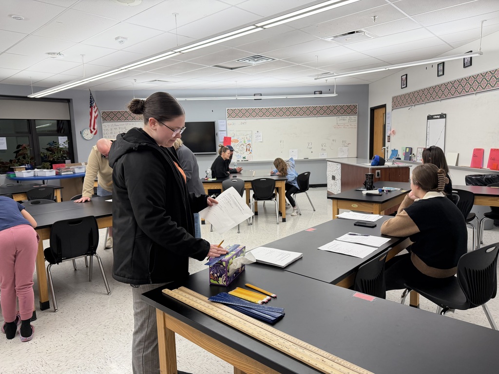 students working on family math night activities