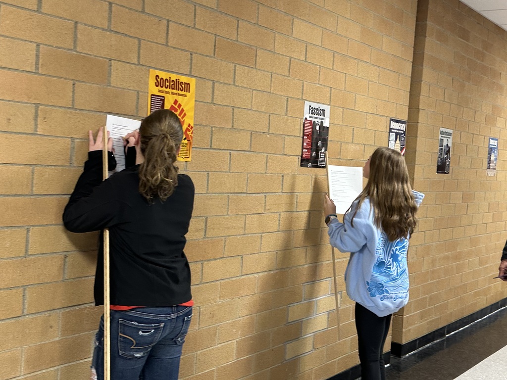 2 Students measuring