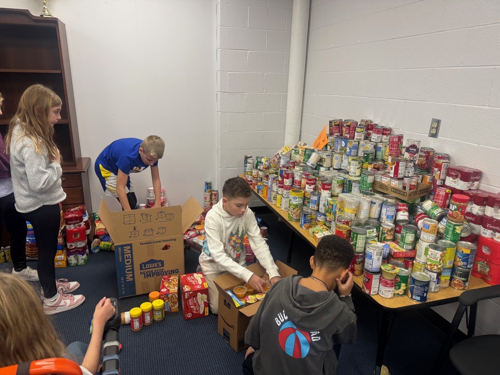 The 5th grade collected 3899 food items for donation to Scott’s Run Settlement House
