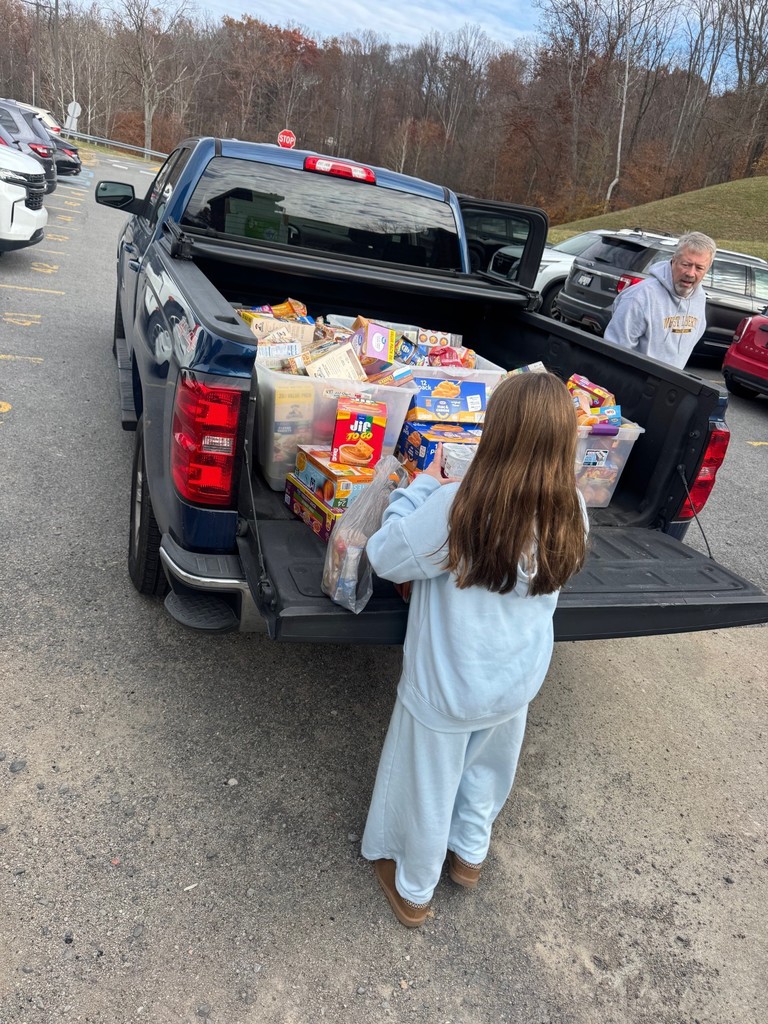 The 5th grade collected 3899 food items for donation to Scott’s Run Settlement House