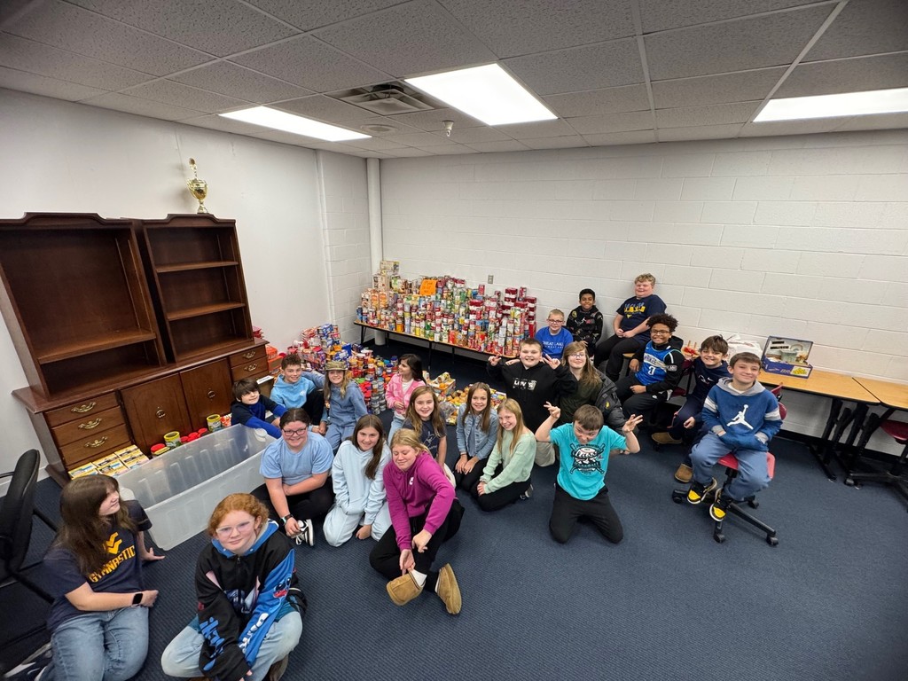 The 5th grade collected 3899 food items for donation to Scott’s Run Settlement House