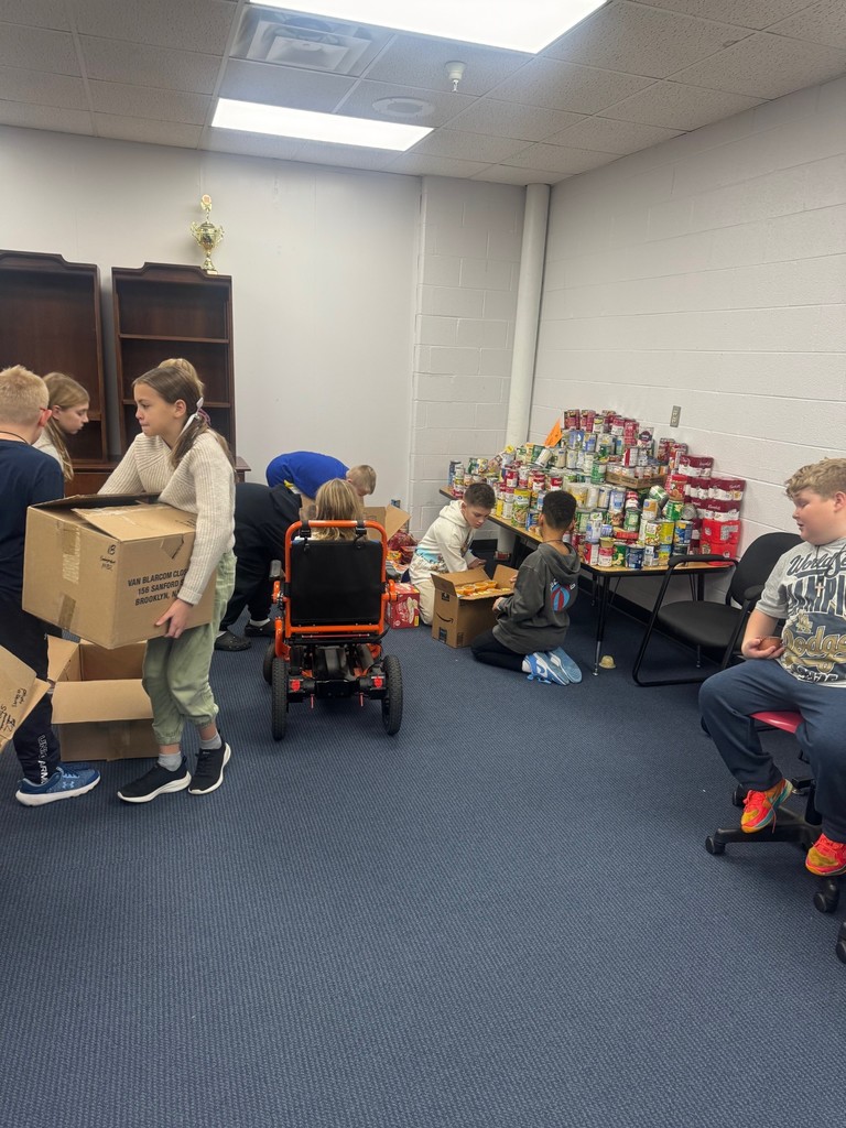The 5th grade collected 3899 food items for donation to Scott’s Run Settlement House