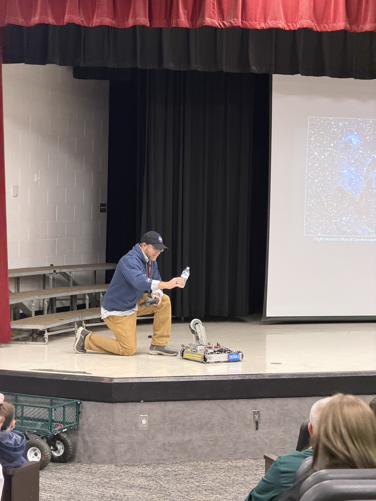 Mr. Finley with a robot