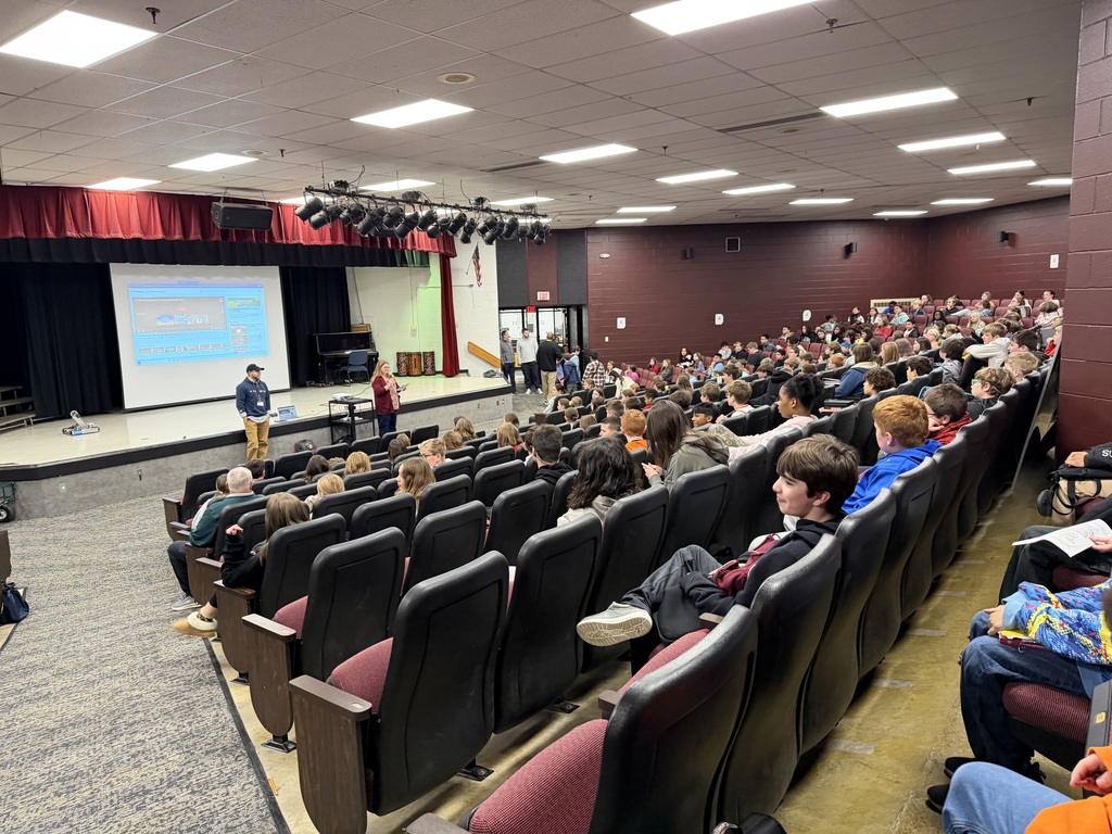 Our students sitting in the auditorium 