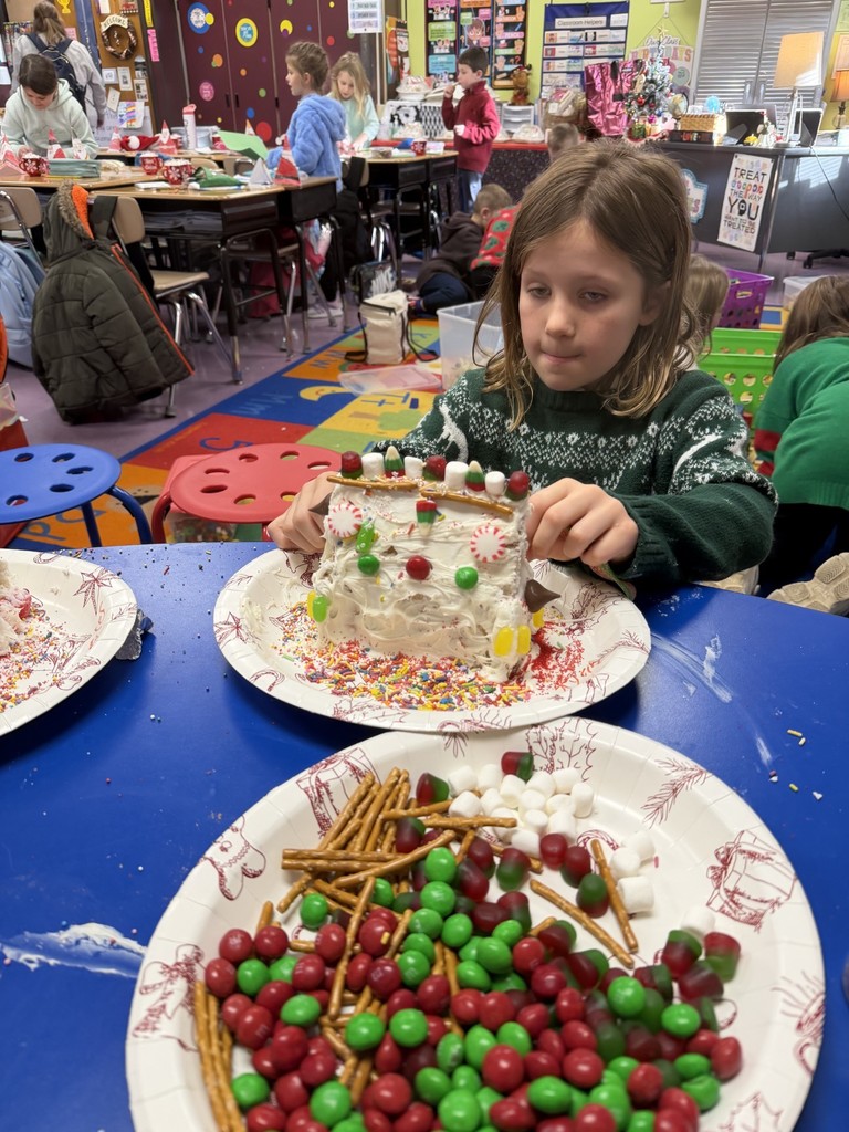The best way to spread holiday cheer is decorating gingerbread houses here!