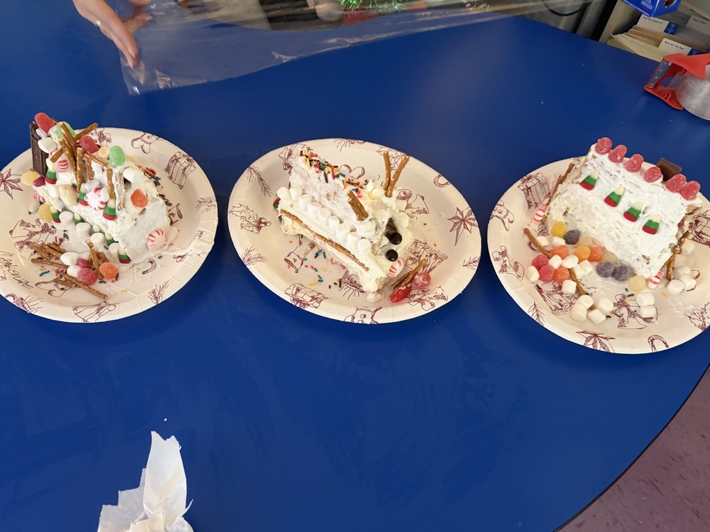 The best way to spread holiday cheer is decorating gingerbread houses here!