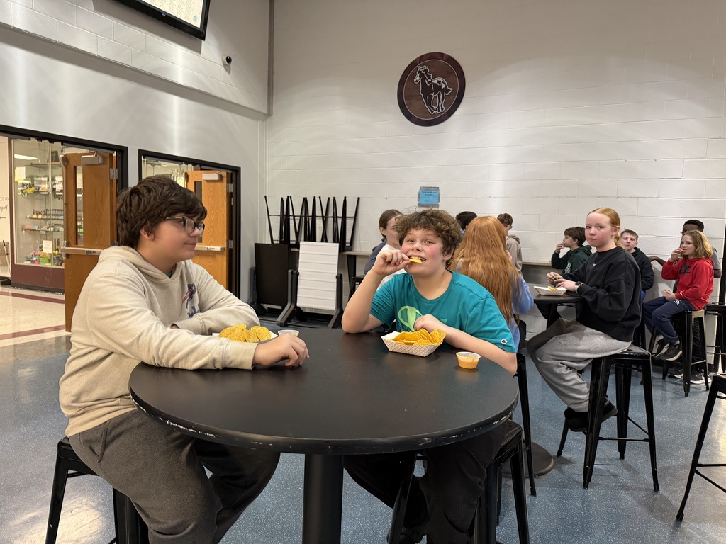 students eating nachos