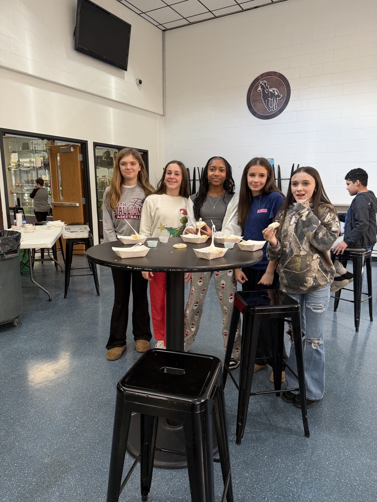 students eating cookies