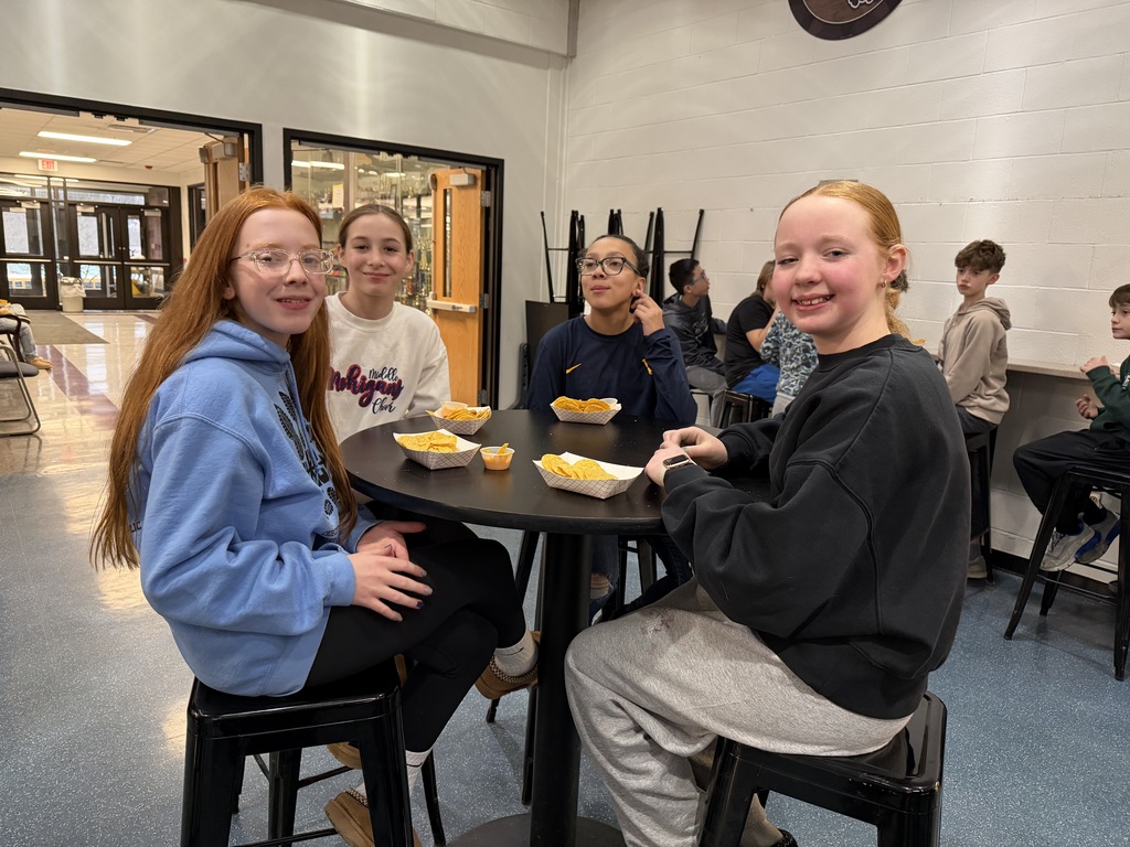 students eating nachos