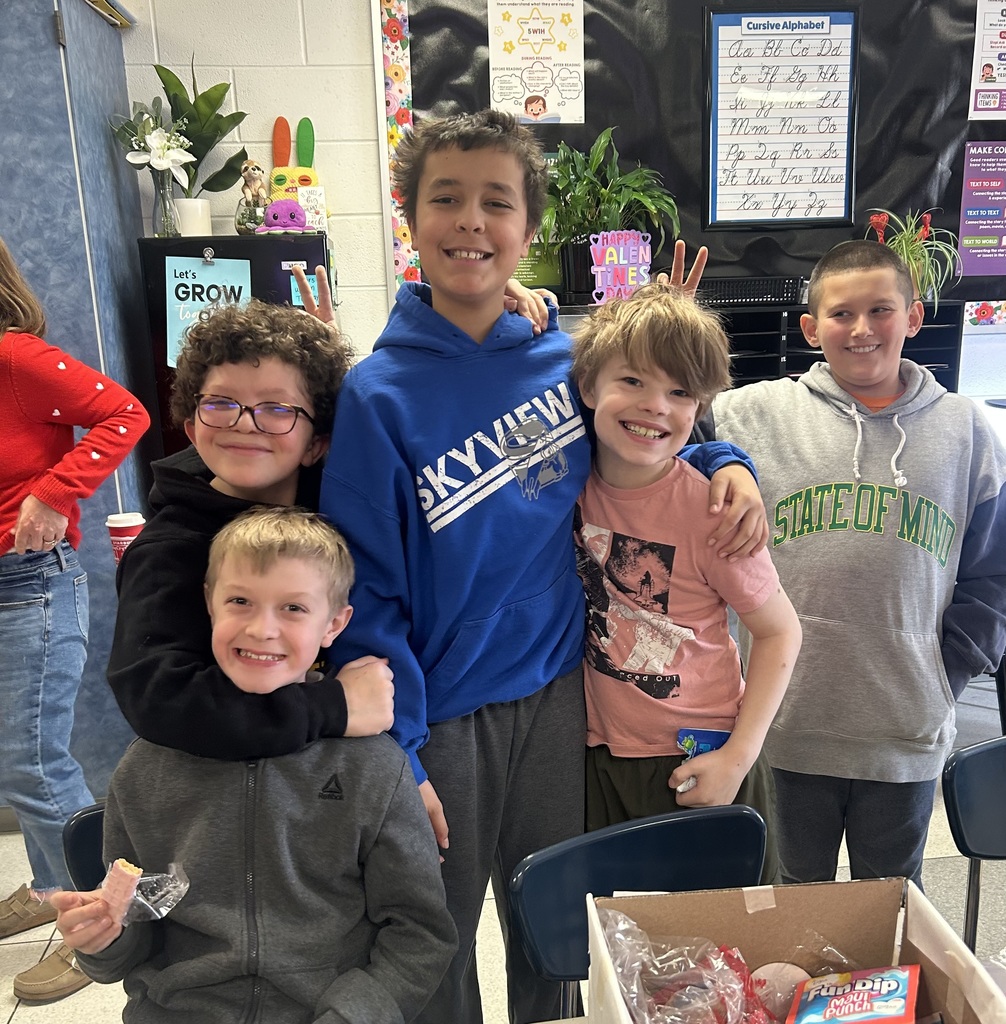 group of fifth grade boys posing 