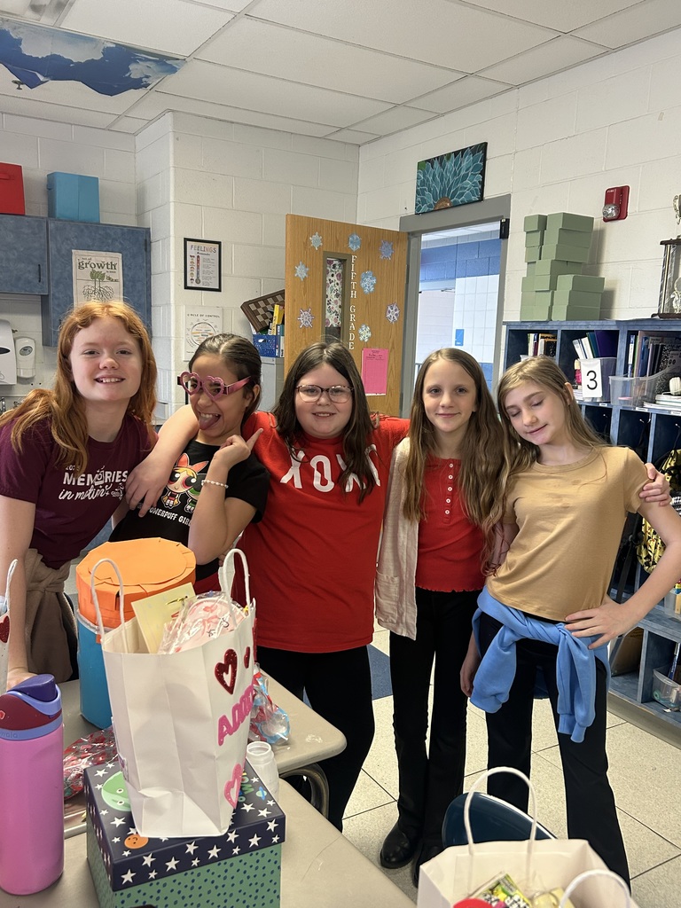 group of fifth grade girls posing 