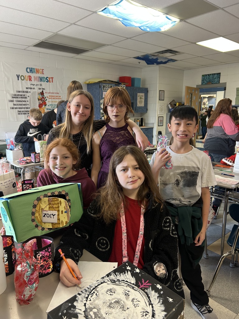 fifth grade students posing at a class valentine party