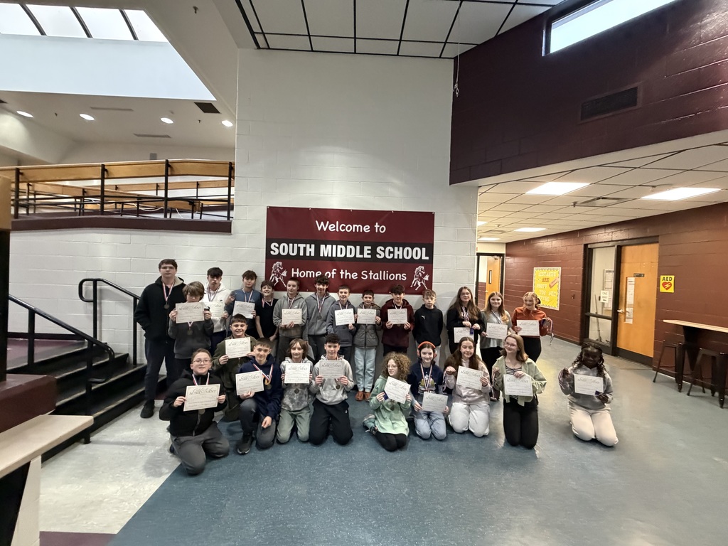 students holding certificates