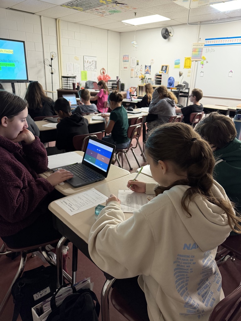 Students working in math class