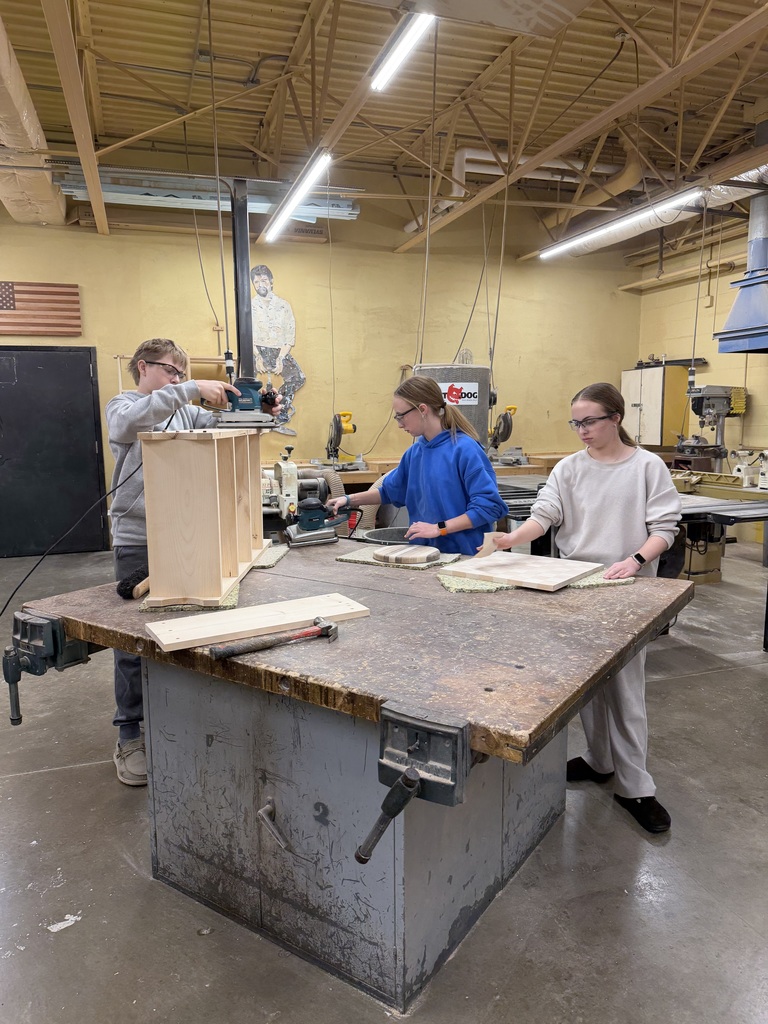 students working in wood shop class