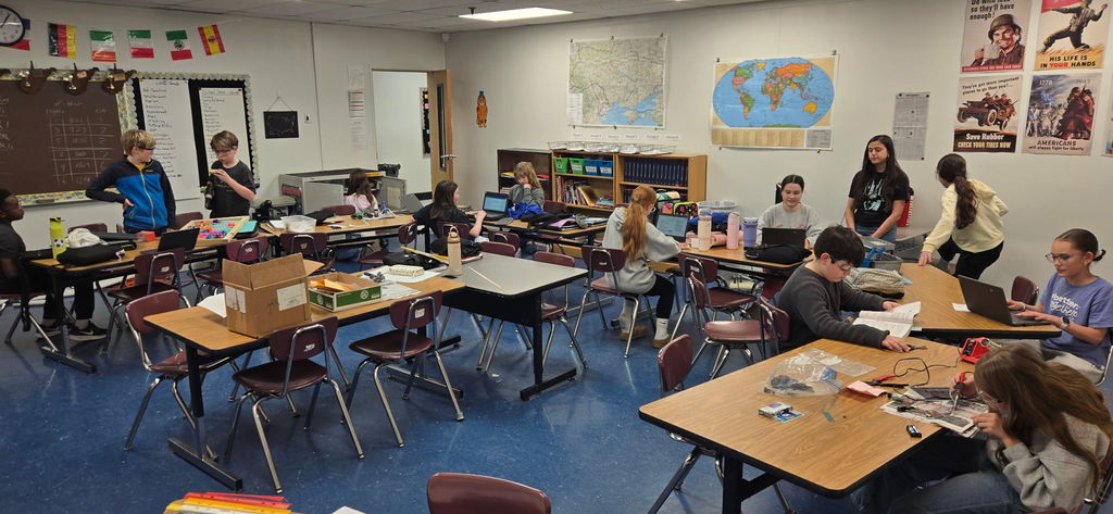 students building in a classroom