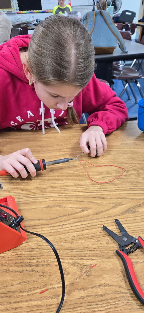 girl working with a wire