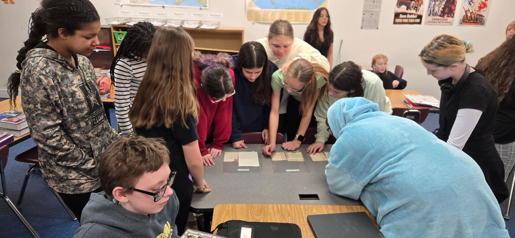 Students working together in SS class