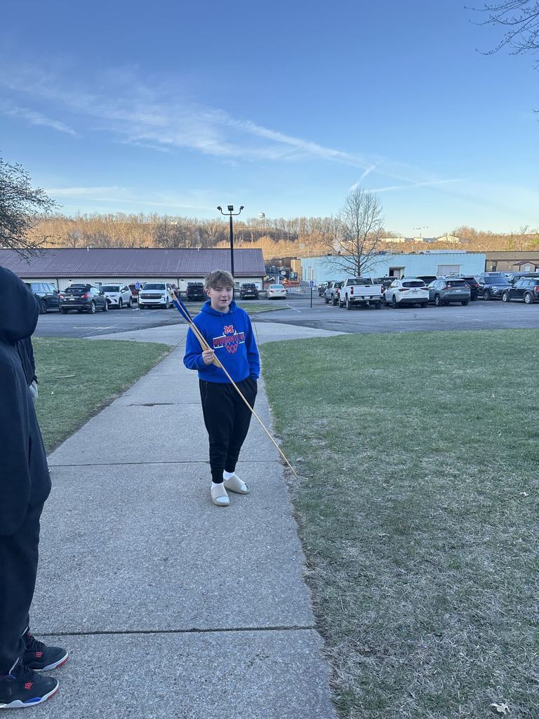 Boy holding an arrow