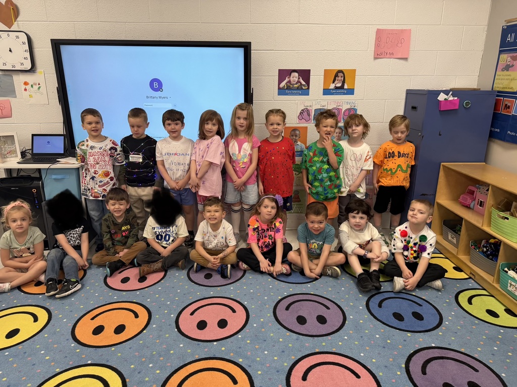 PreK kids with 100th day shirts.