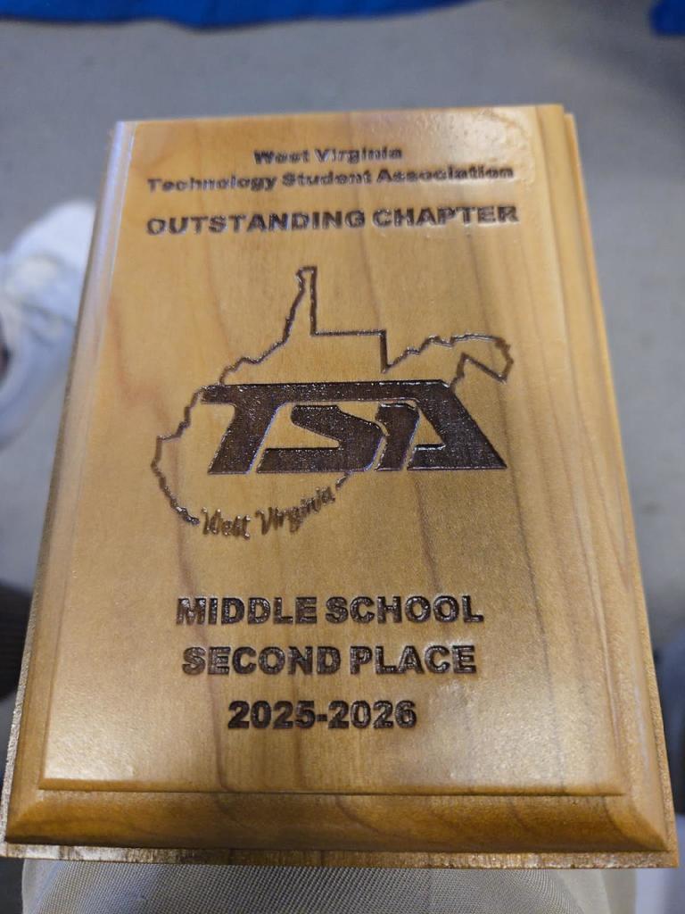 Piece of wood saying TSA Middle School Second Place 2025 - 2026