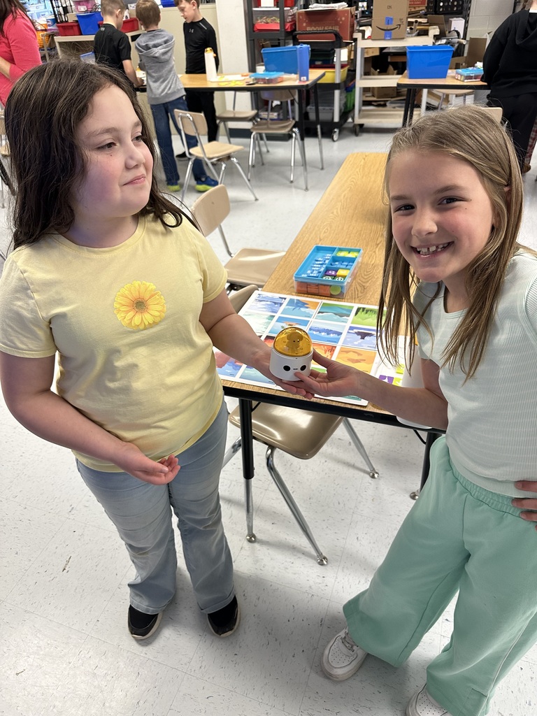 Students programming "robots".
