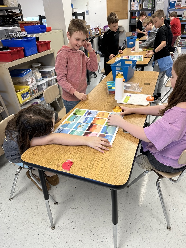 Students programming "robots".