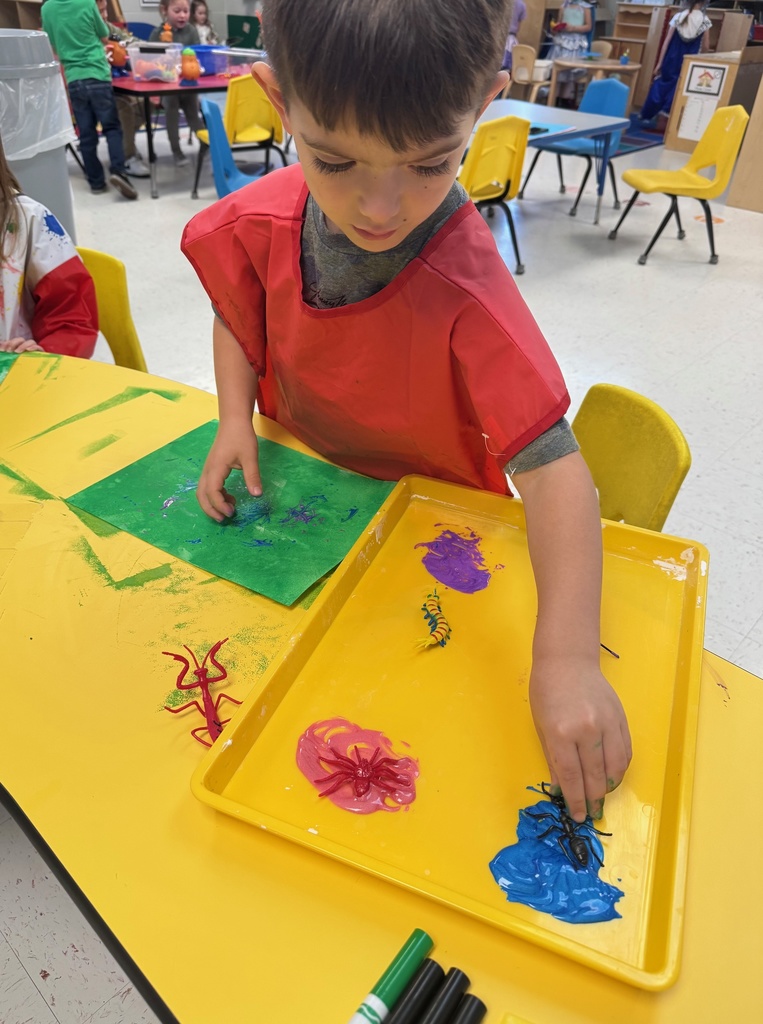 student using bug as a paint template