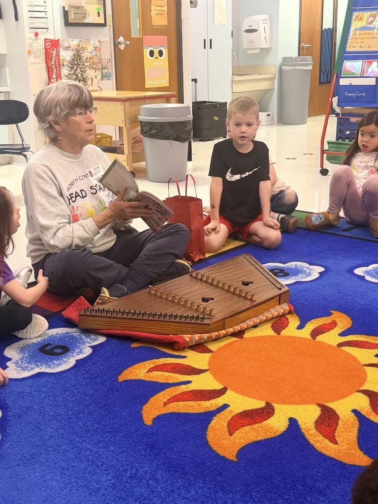 Pre-K students listening to a WV author read aloud. 