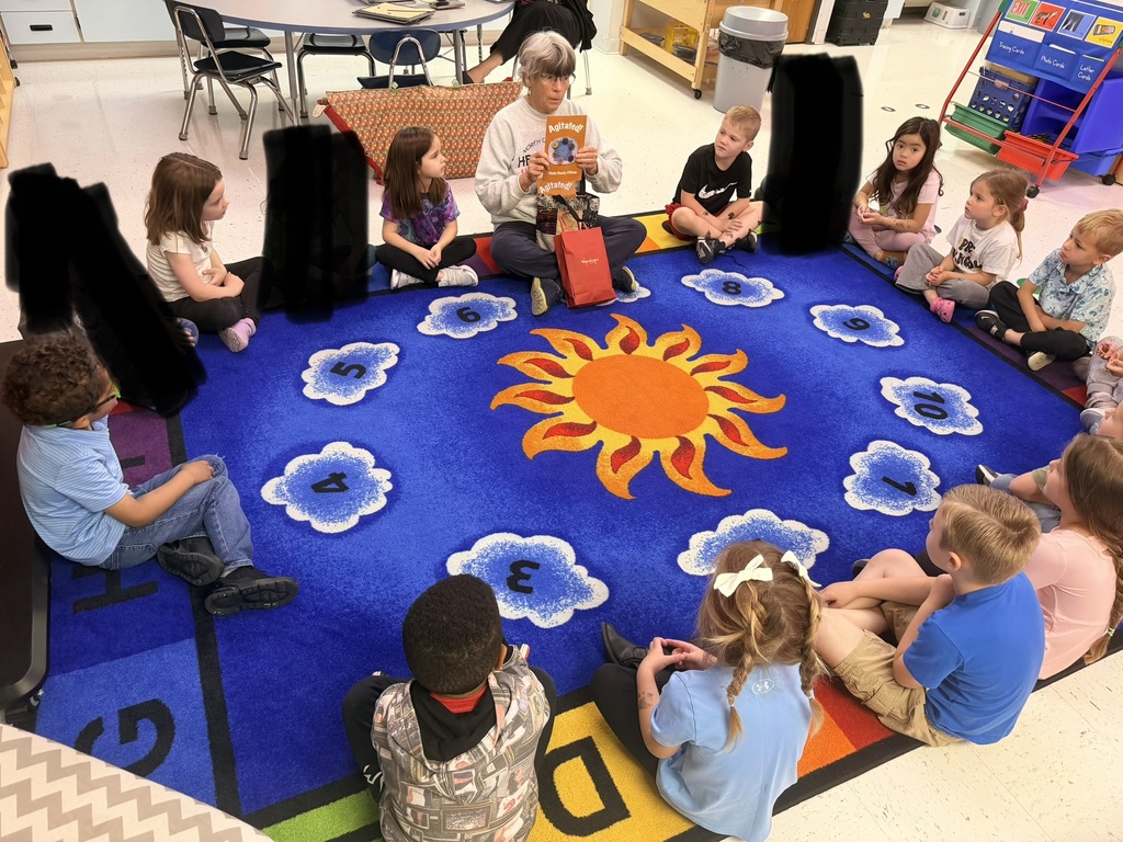 Pre-K students listening to a WV author read aloud. 