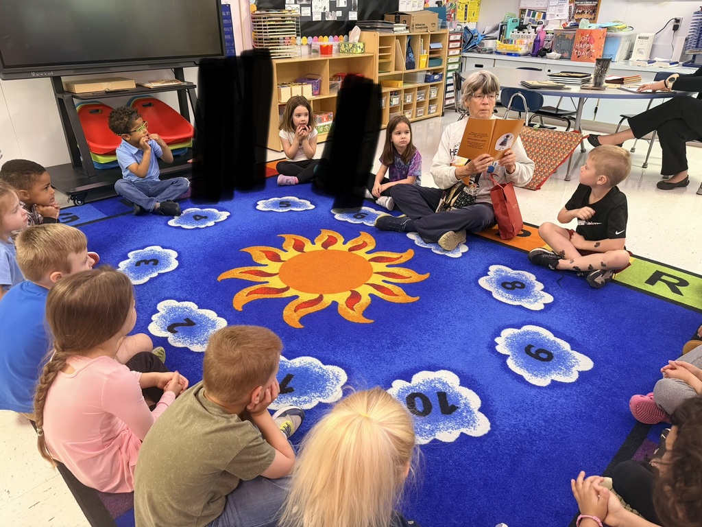 Pre-K students listening to a WV author read aloud. 
