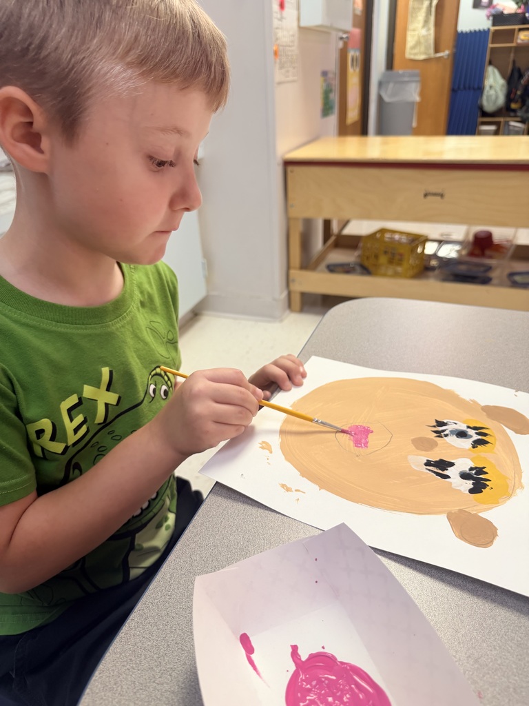 Student painting self portrait