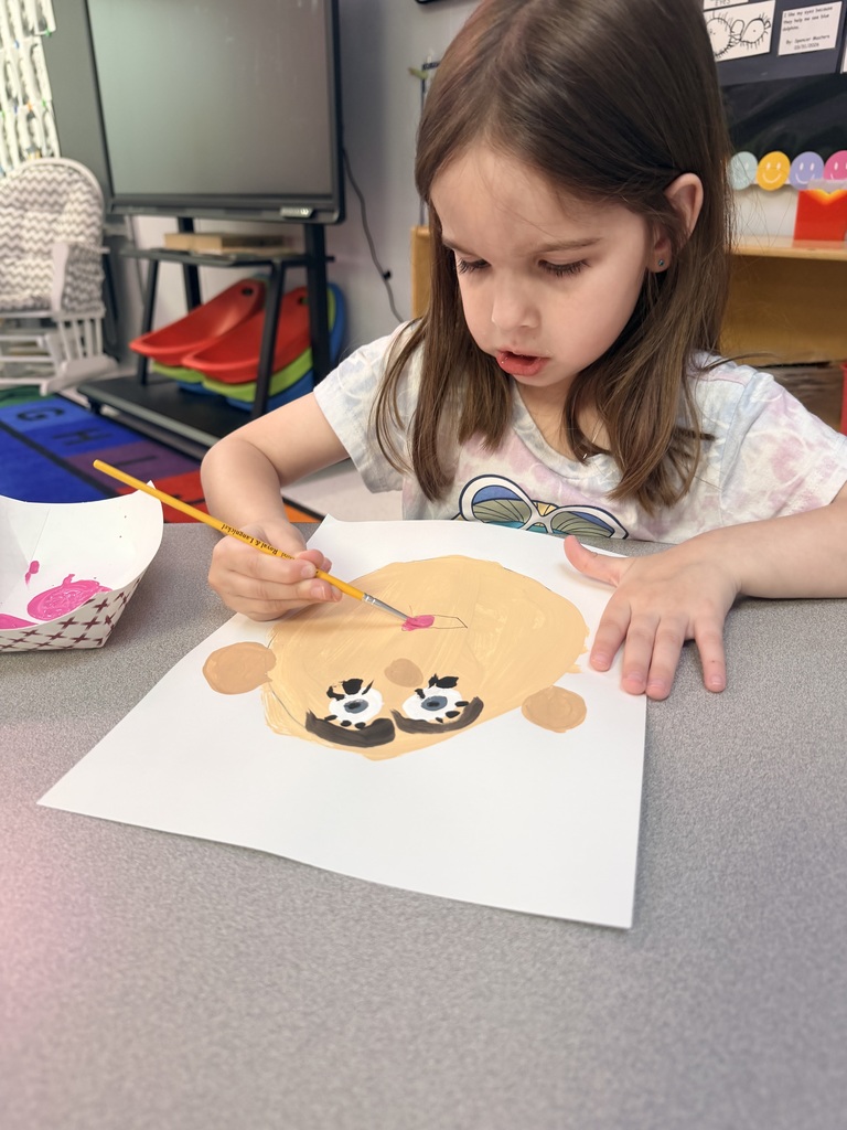 Student painting self portrait