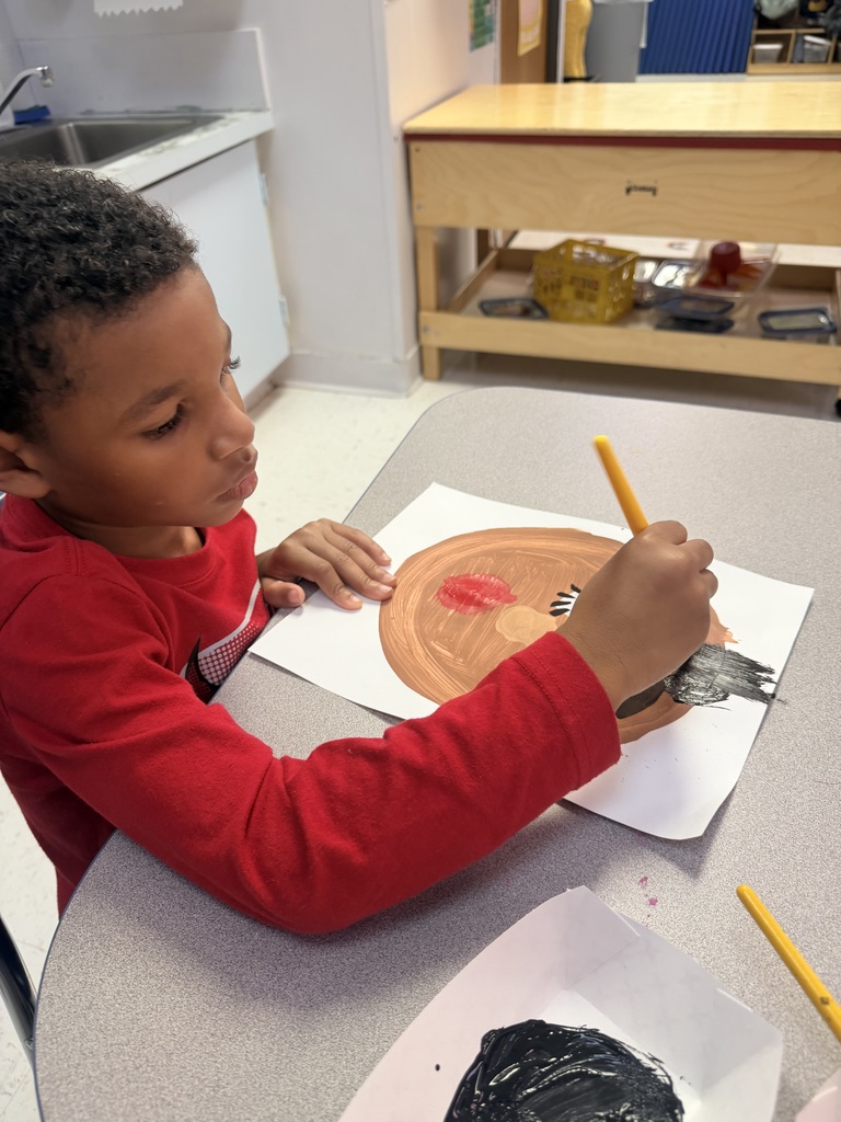 Student painting self portrait