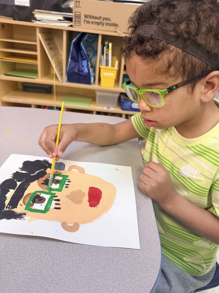 Student painting self portrait