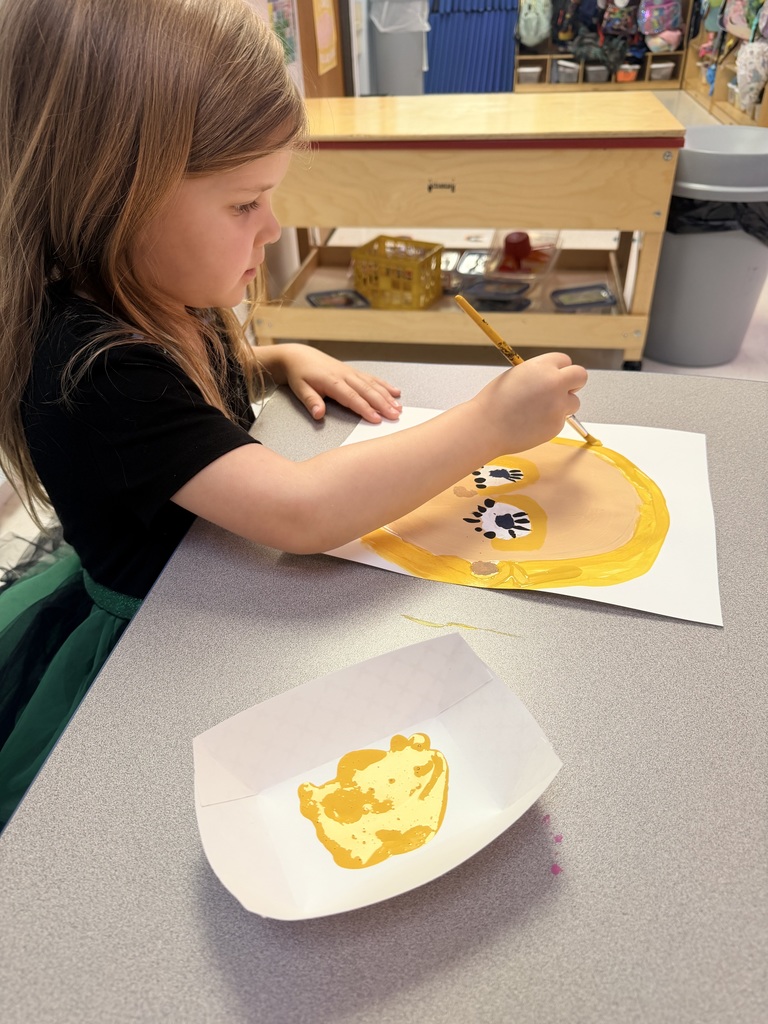 Student painting self portrait