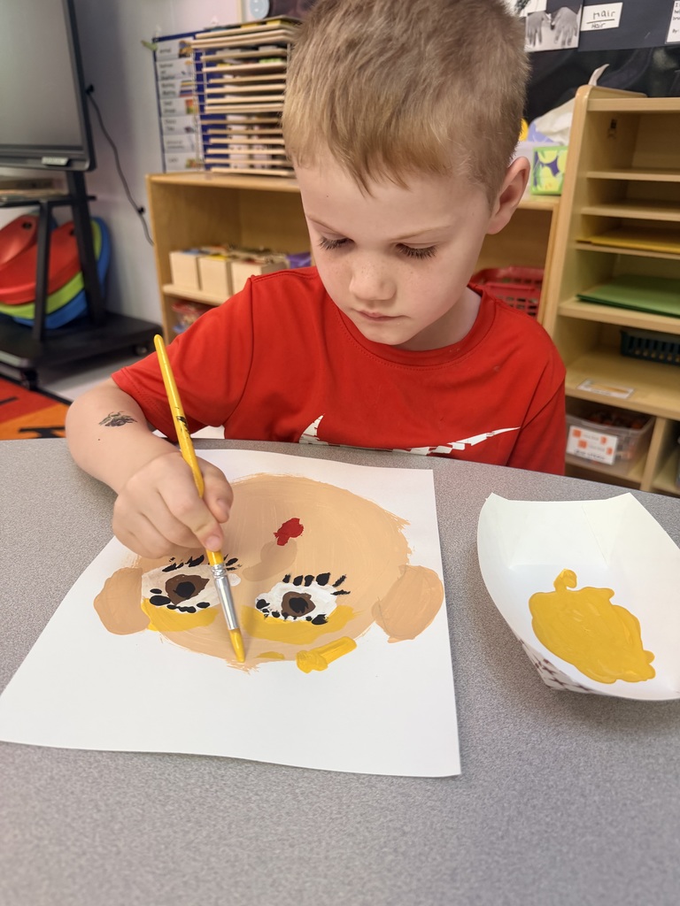Student painting self portrait