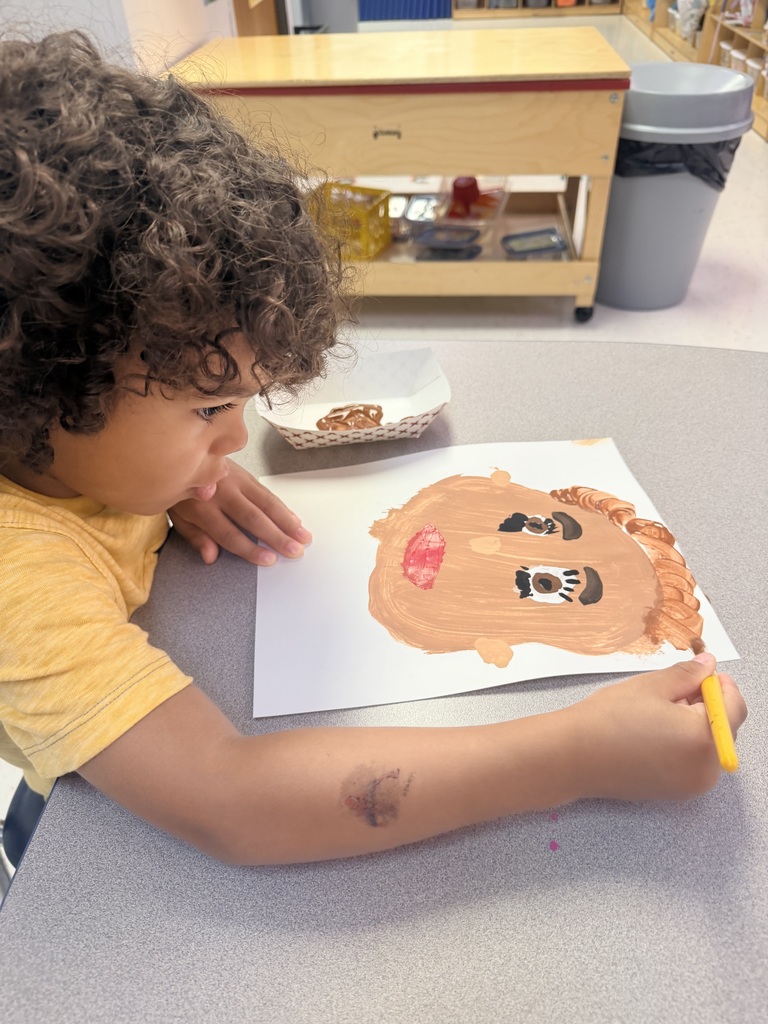 Student painting self portrait