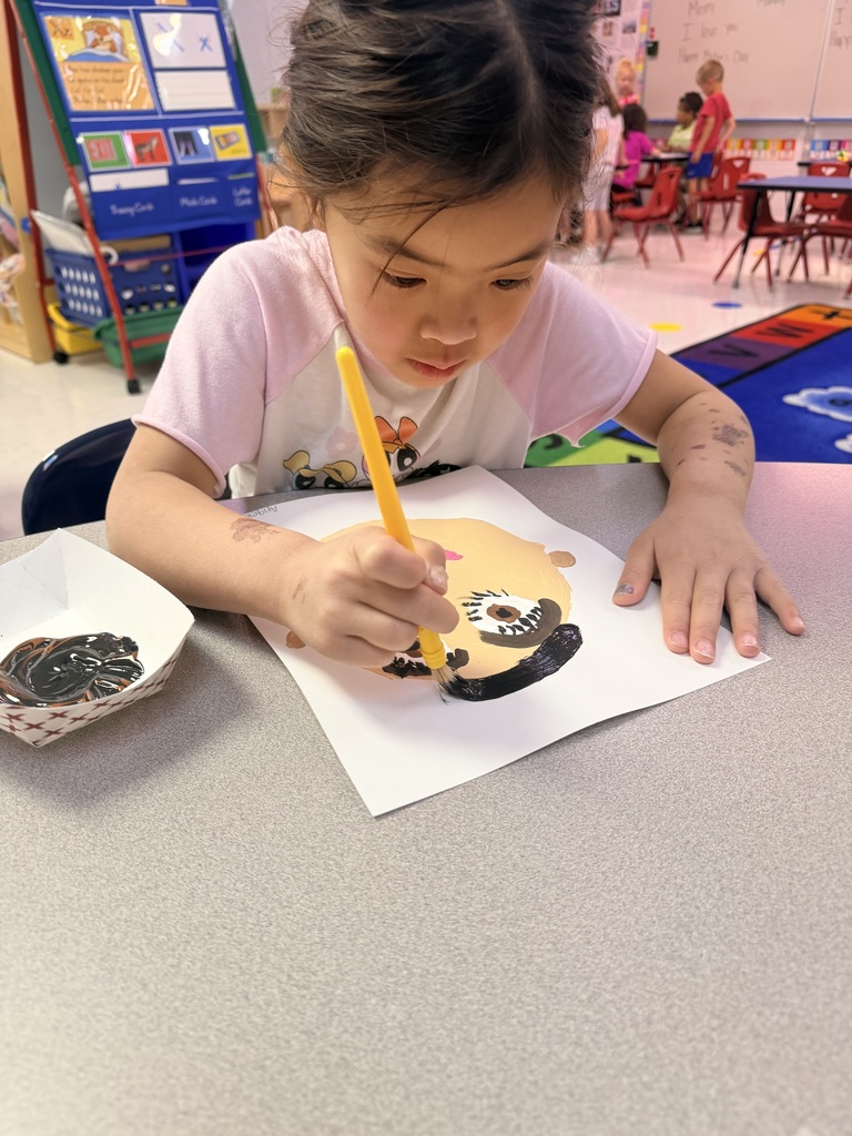 Student painting self portrait