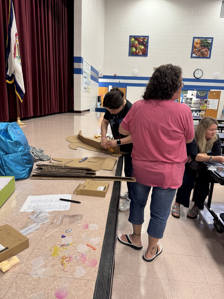 Cheat Lake Elementary service personnel hard at work on their Mascot Mania Challenge!