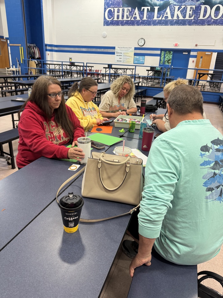 Cheat Lake Elementary service personnel hard at work on their Mascot Mania Challenge!